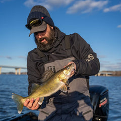 @chicagosurfer with a walleye on the fox river in depere with a baddboyz green lantern jig