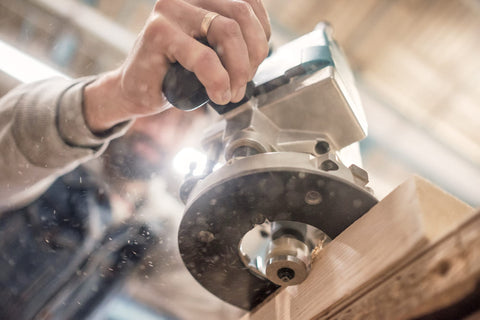 man using woodworking machinery