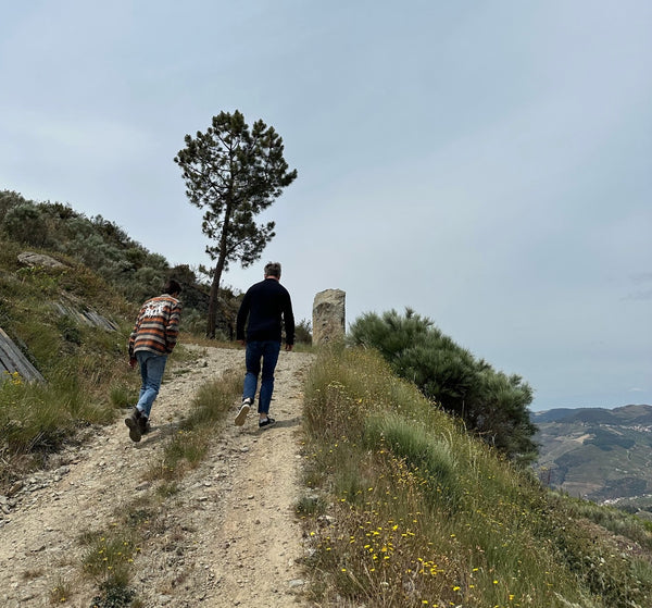 walking up a rugged wind-swept hill in Duoro