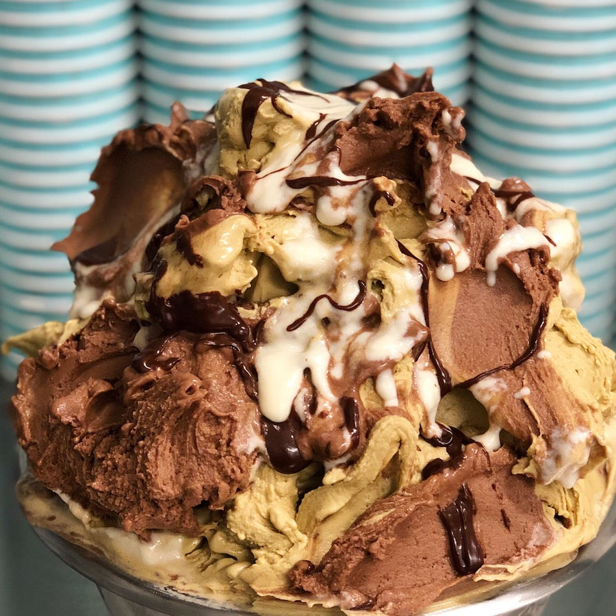 Mozart Ice Cream comes with delicious vegan pistacchio ice cream and nougat ice cream topped with marcipan and nougat sauce.