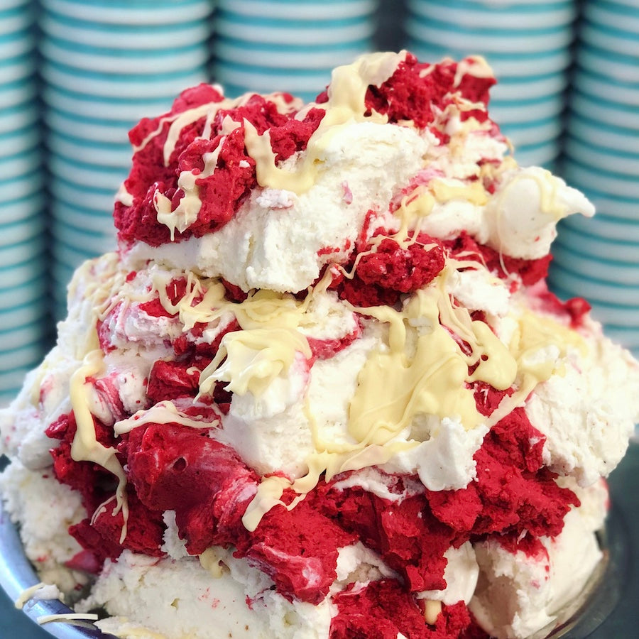 Tonka Ice Cream with Raspberry sorbet gets topped with white chocolate