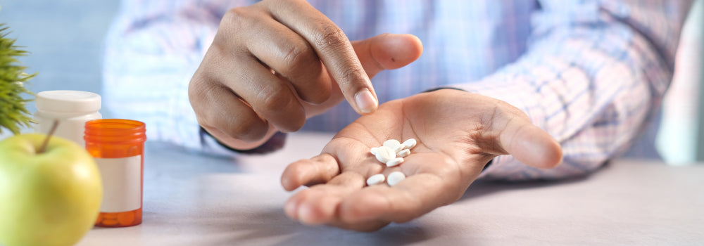 Antibiotics in a man's hand