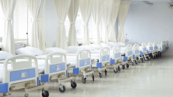 A line of hospital beds fitted with anti static wheels and castors which are essential for reducing the potential dangers of static shocks in healthcare settings.
