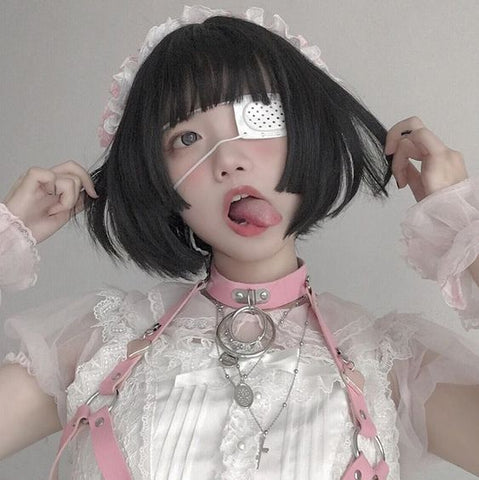asian girl with black hair wearing a pink choker with silver o rings in the middle, one o ring inside the other, and white Harajuku style fashion with a lacy top