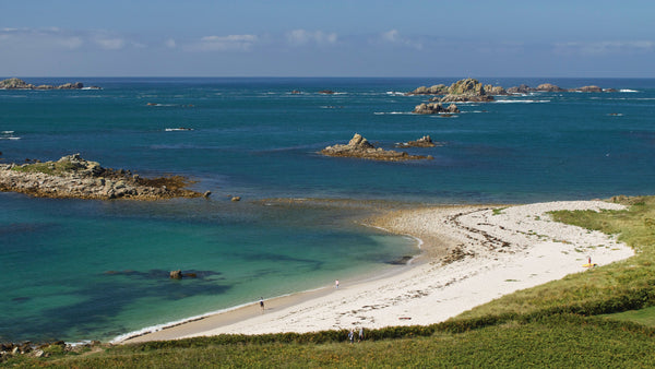 Looking over Rushy Bay on Bryher to Northern or Norrard Rocks, Isles of Scilly