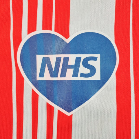 Love the NHS heart LOGO on football shirt 