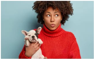 A Girl Holding a dog