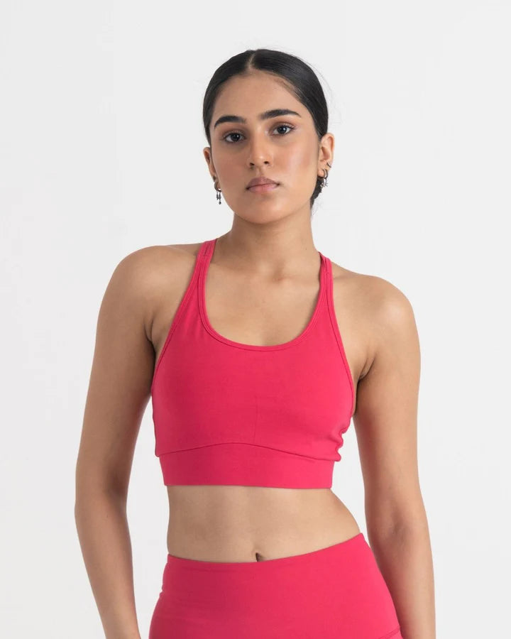 women wearing pink sports bra