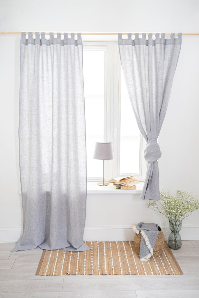set of linen curtains in grey color