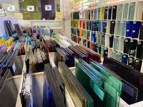 racks of colorful art glass