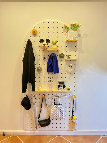 Illuminating-pegboard-display-for-showcasing-lighting-in-retail-stores