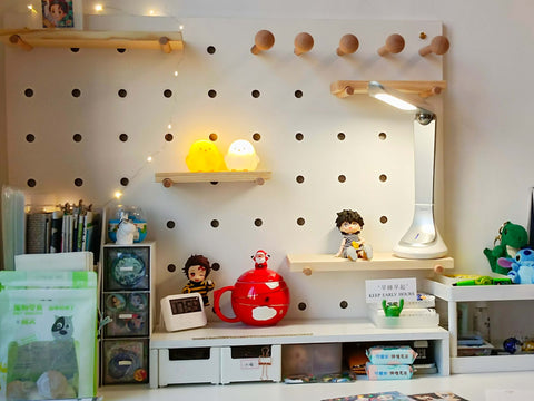 wooden-pegboard-display-on-desk