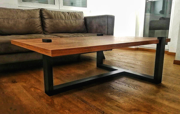 This coffee table brings an industrial chic vibe to your home with its robust handcrafted metal frame and solid wooden top. The juxtaposition of natural wood with the sleek metal creates an eye-catching piece that’s both practical and stylish. It’s designed to be the focal point of your living space, embodying the essence of modern craftsmanship.