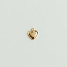 Tiny gold heart