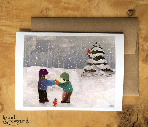 Mixed media collage of children in the snow looking at a glowing object together.
