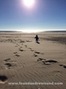 little man at the beach