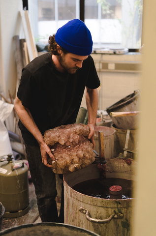 Isaac Monte making a crystal vase 