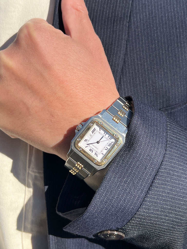 Cartier watch: Photo of a person wearing a vintage Santos Galbe