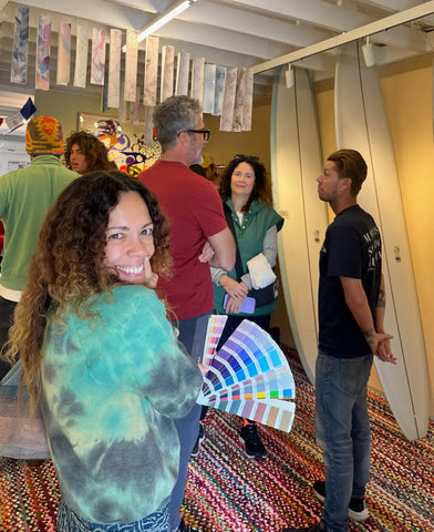 Woman smiling at the launch of the Aqueous surf board launch