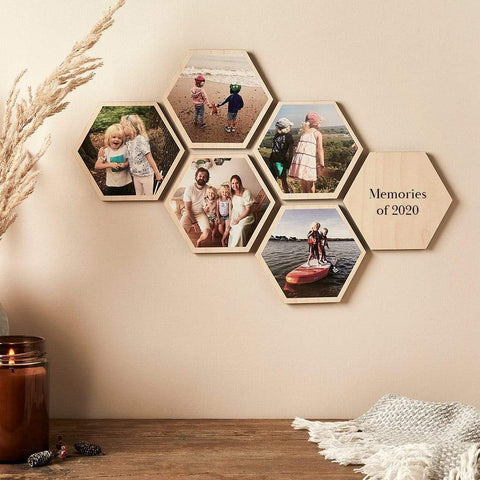 A set of wooden hexagon shapes printed with family photographs - handmade by Create Gift Love
