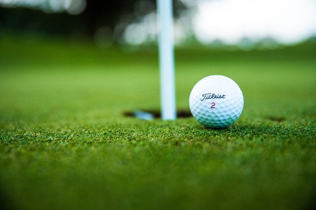 close up of golf ball on green