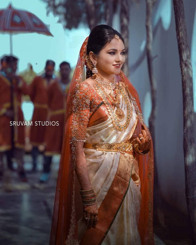 30+ South Indian Blouse Designs for a Royal Bridal Look | South indian  wedding hairstyles, South indian bride hairstyle, Indian bride hairstyle