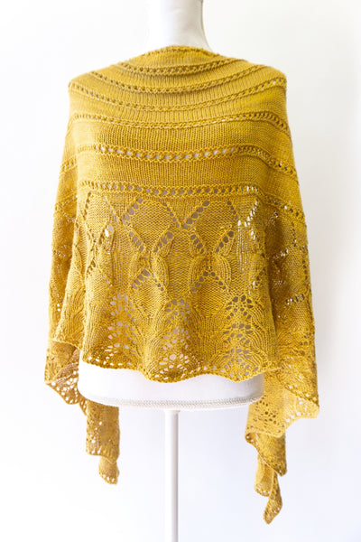 lace shawl knitted with semi-solid tonal hand-dyed yarn