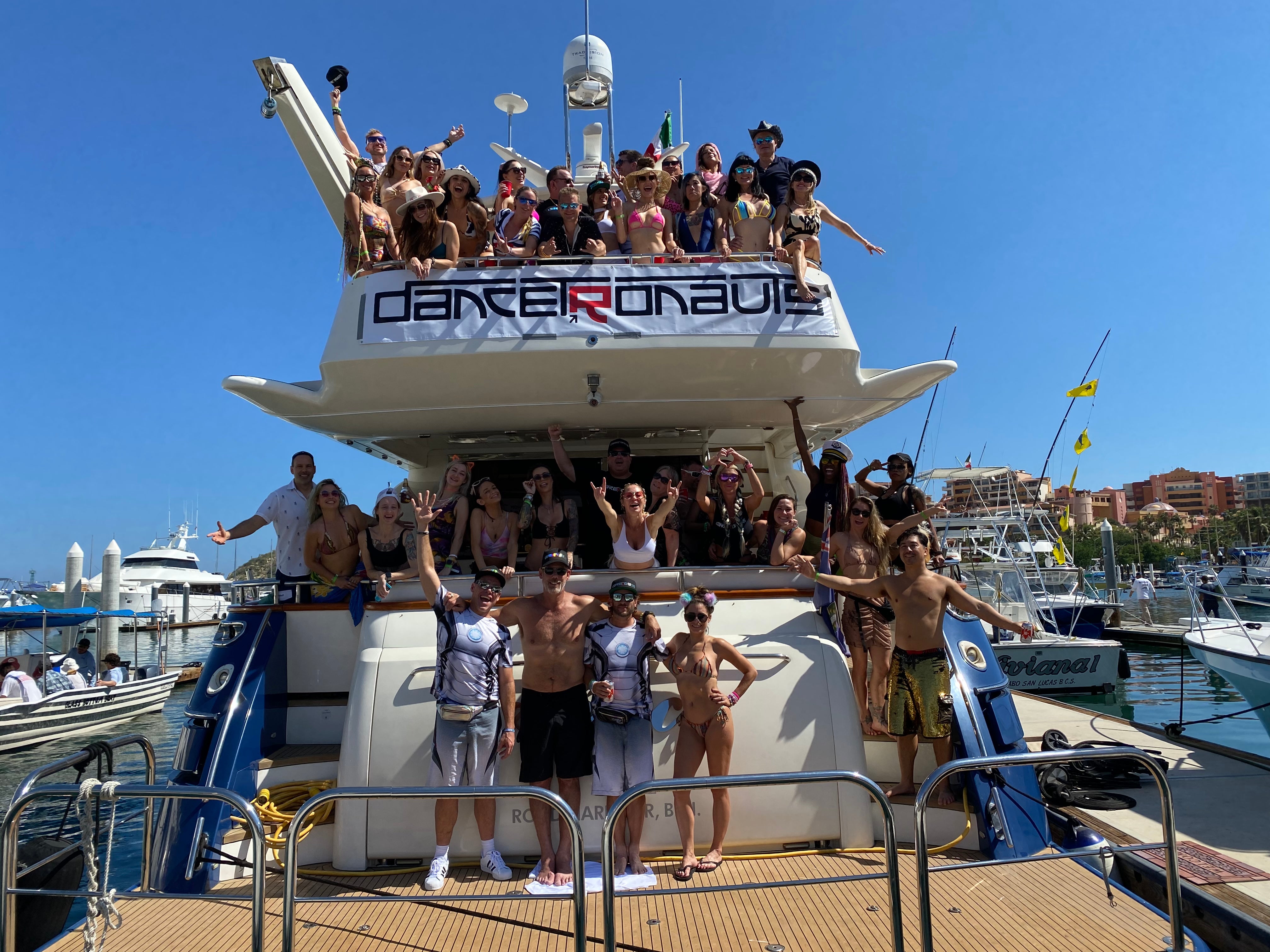 Large dance party on a 85' Private Yacht Charter in Cabo San Lucas, Mexico | Best Cabo Yachts