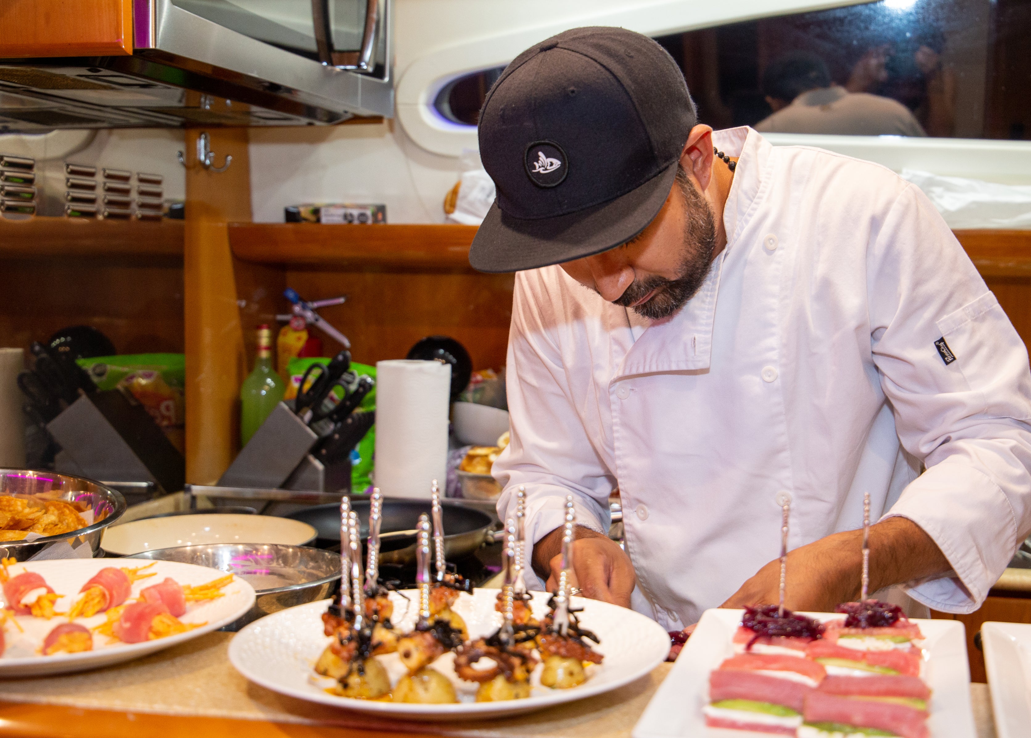 Private Chef cooking up some delicious appetizers aboard a private yacht charter in Cabo San Lucas, MX