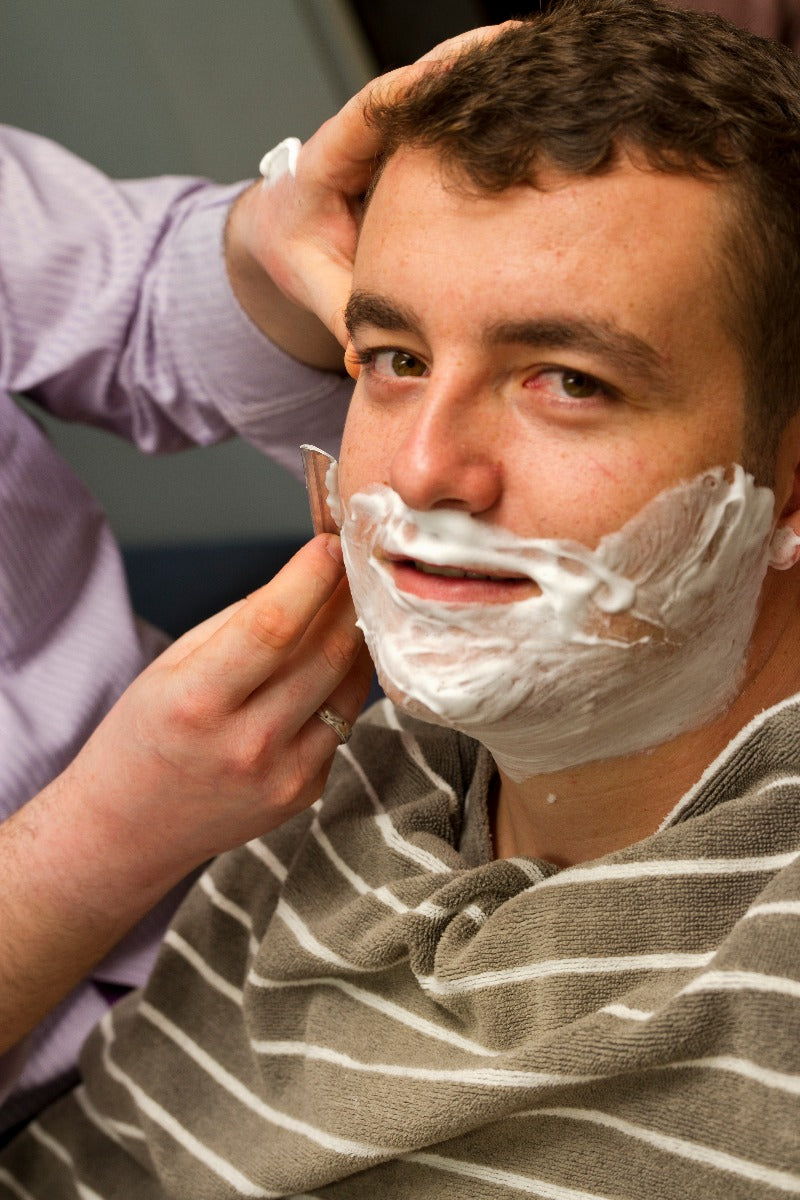 Shaving at the barber