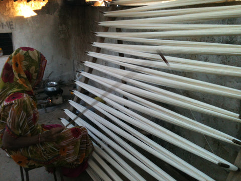 Weaver preparing Kala Cotton weft for Weaving Kutch