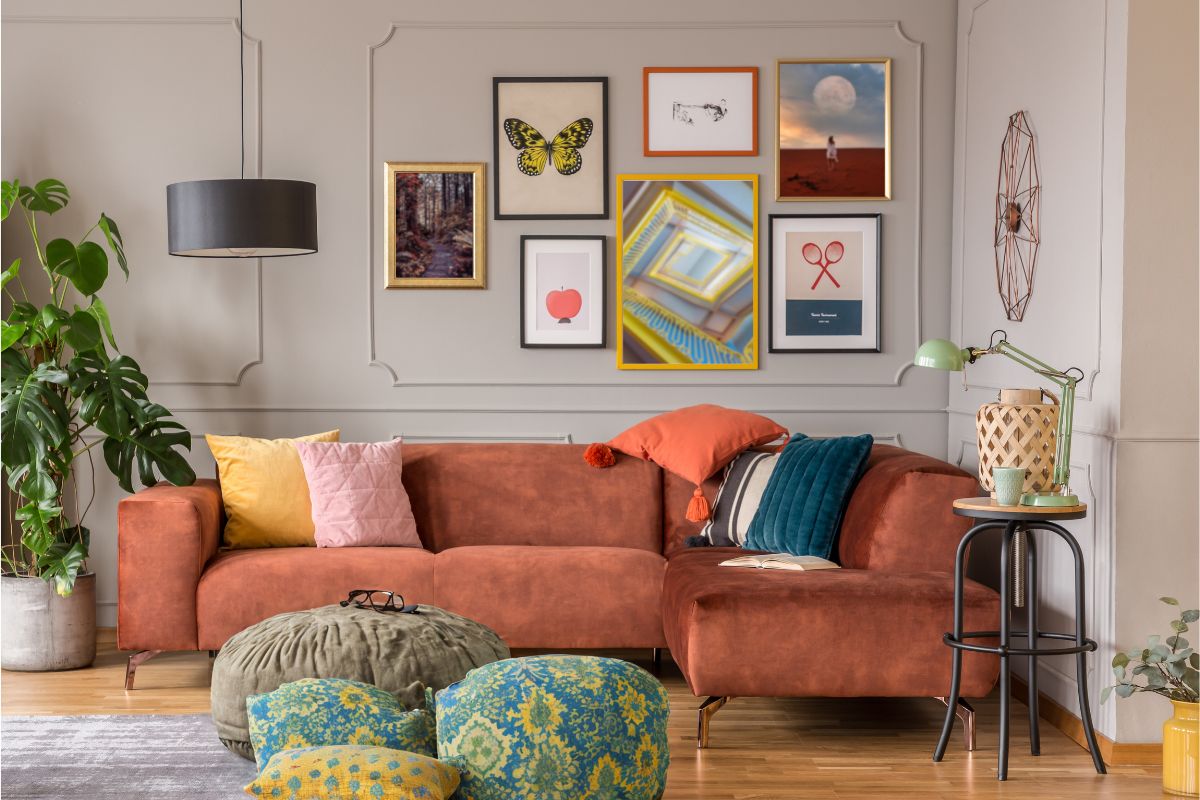 eclectic living room with whimsical wall art