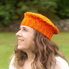 Woman wearing an orange hat