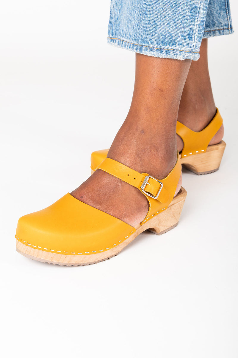 mustard yellow clogs