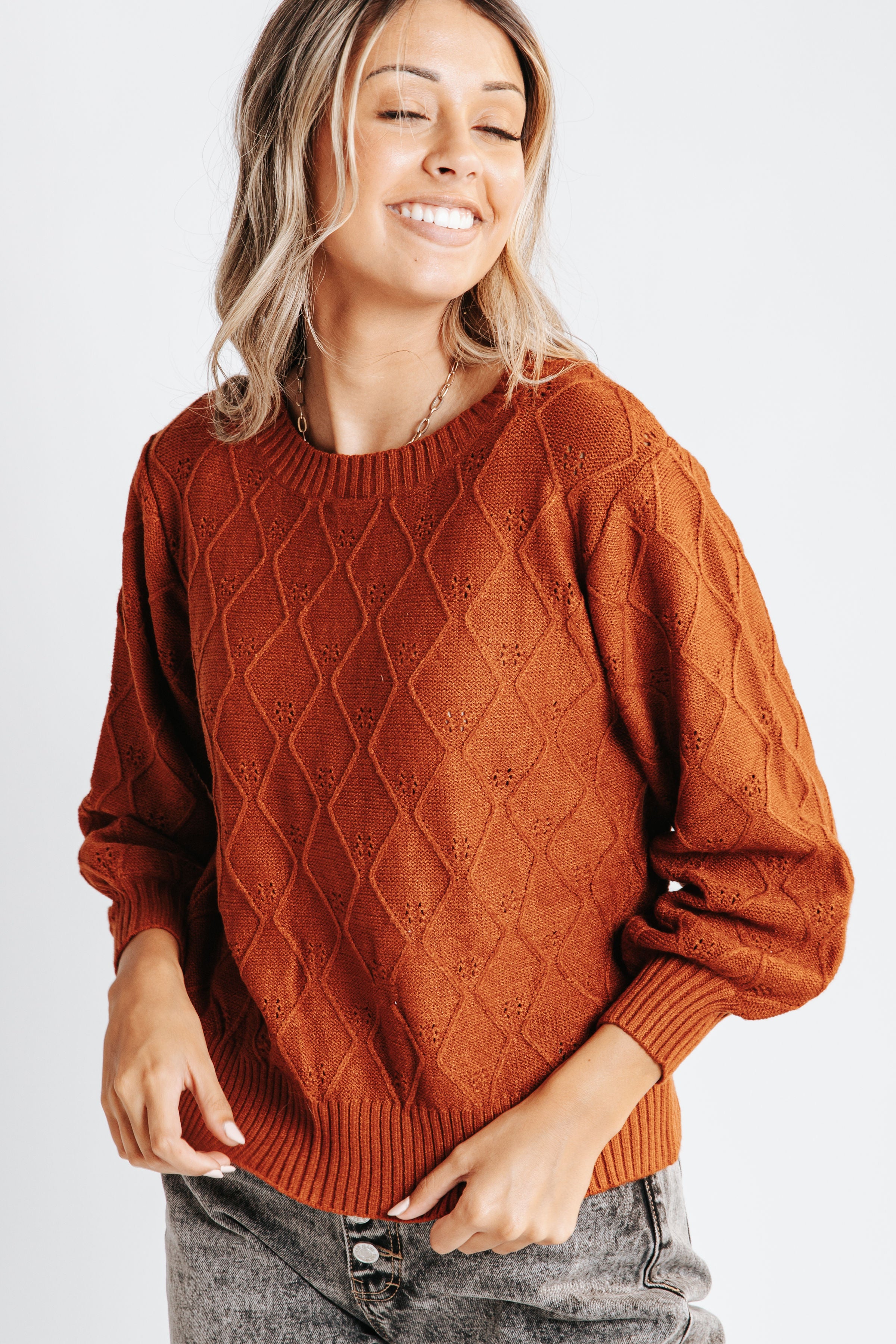 The Glover Diamond Eyelet Sweater in Rust