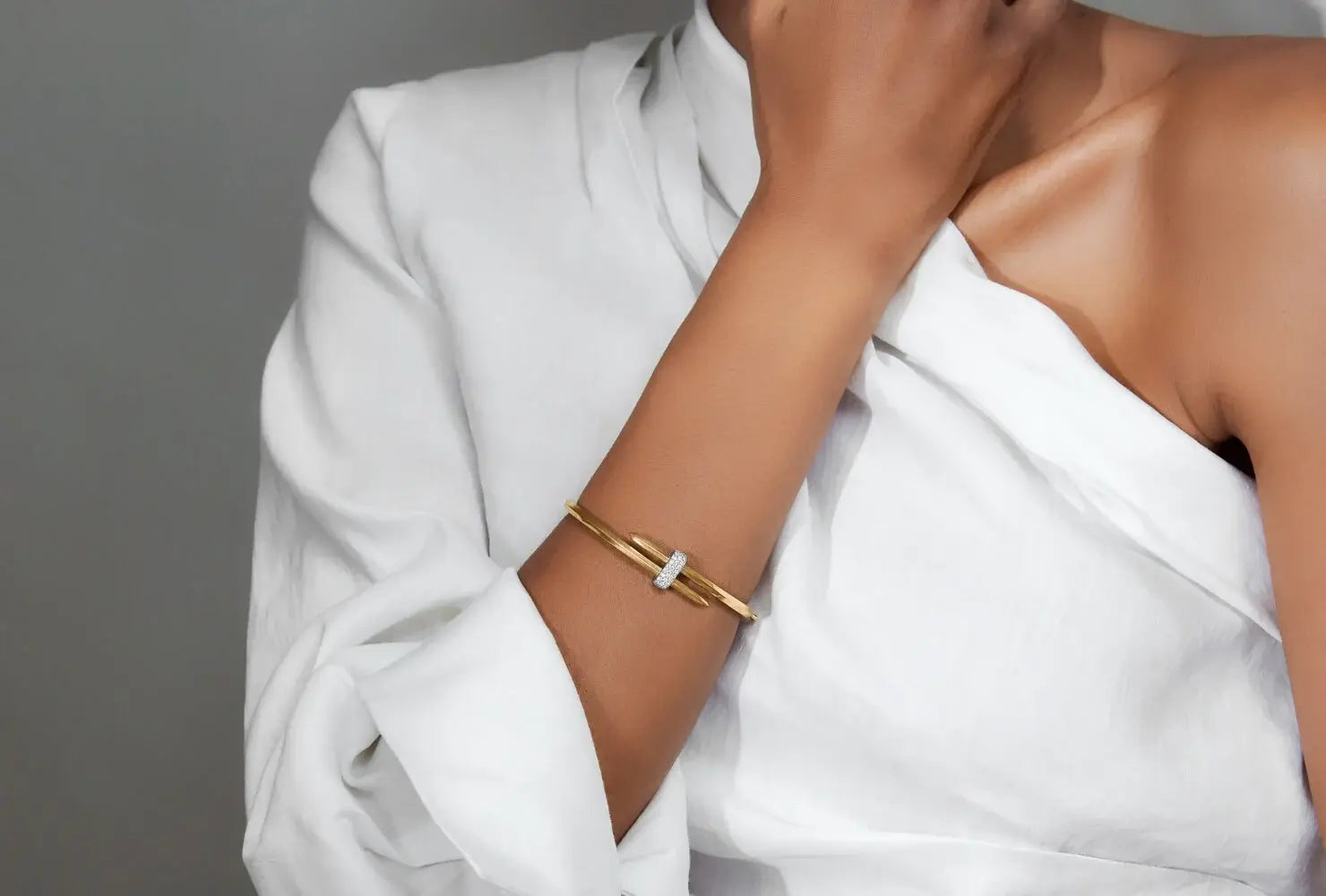 Model wearing Ecksand Duel Diamond Pavé Wrap Bangle