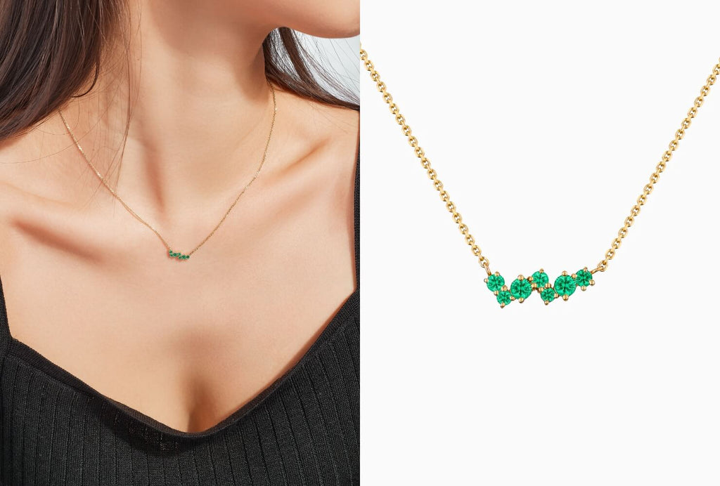 Model wearing Ecksand emerald necklace with pavé