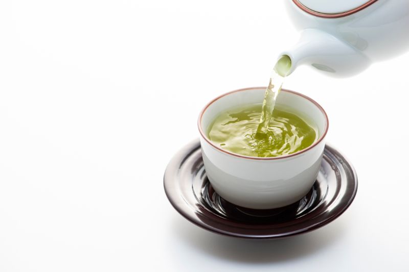 pouring a premium green tea