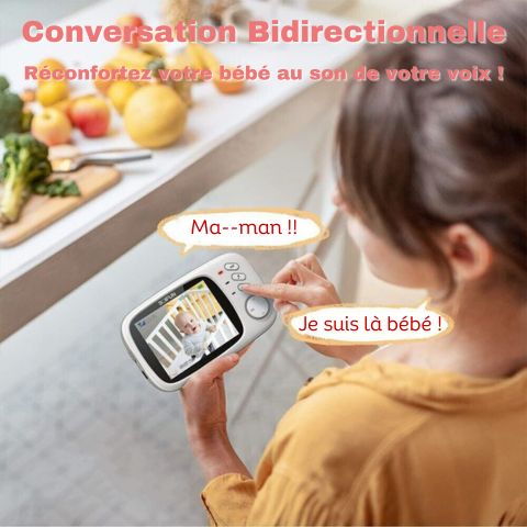 Une mère parlant à son bébé à travers l'écran du babyphone vidéo, illustrant la fonction de communication bidirectionnelle de l'appareil.