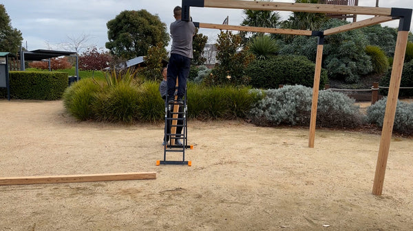 Install the post leg of pergola kits