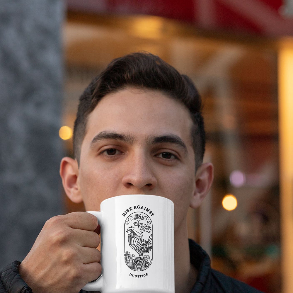 https://cdn.shopify.com/s/files/1/0684/4727/products/15-oz-mug-mockup-featuring-a-young-man-drinking-a-coffee-30826_1000x1000.jpg?v=1660602949