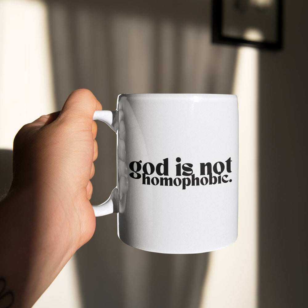 https://cdn.shopify.com/s/files/1/0684/4727/products/sticker-mockup-featuring-a-man-holding-a-coffee-mug-33617_1000x1000.jpg?v=1673623089