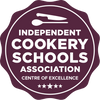 Independent Cookery Schools Association Centre of Excellence logo - purple rosette with 5 stars