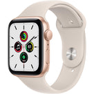 Apple Watch Series SE 1 (2020) GPS 44 mm - Aluminium Gold - Sport band Starlight
