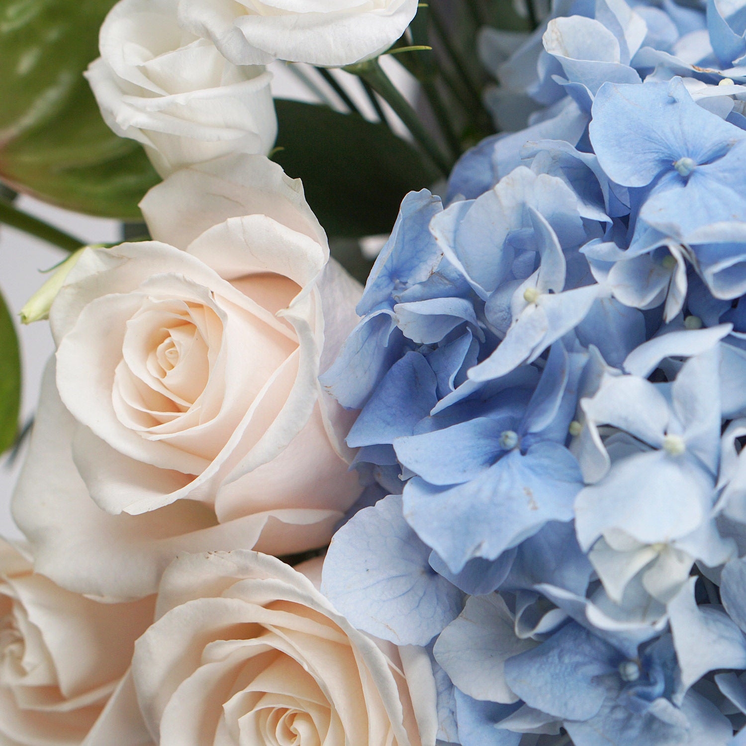 Captivating Mixed Flowers Blue Glass Vase
