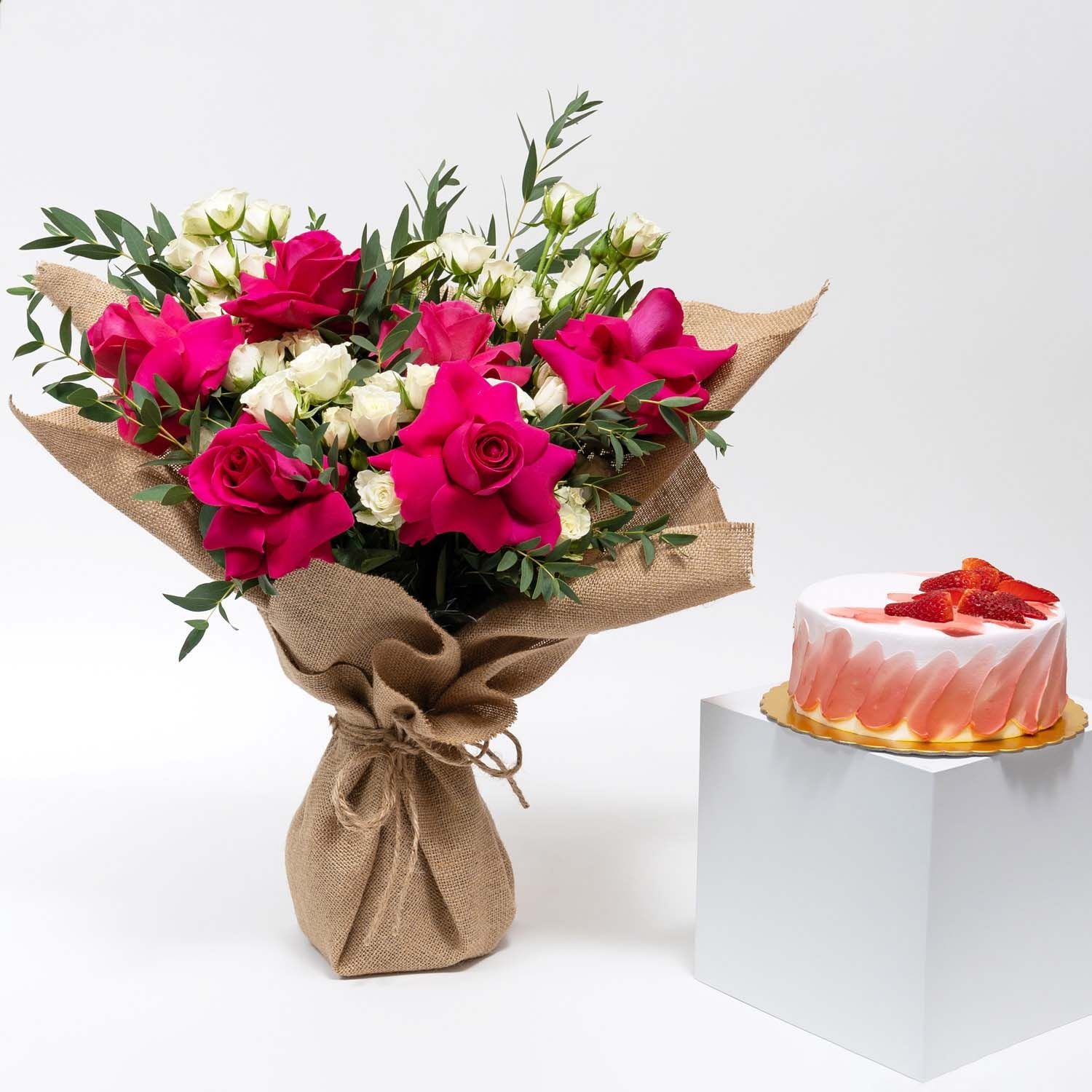 Beautifully Wraped Hand Bouquet with Strawberry Cake