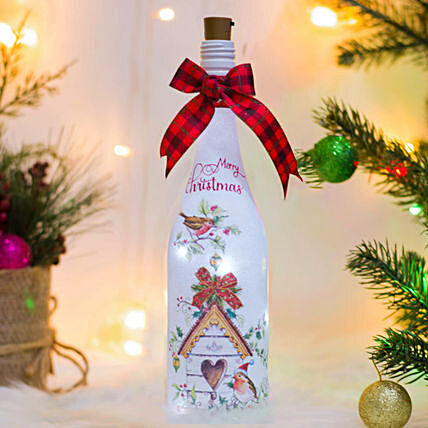 زجاجة مرسومة يدويًا لعيد الميلاد المجيد