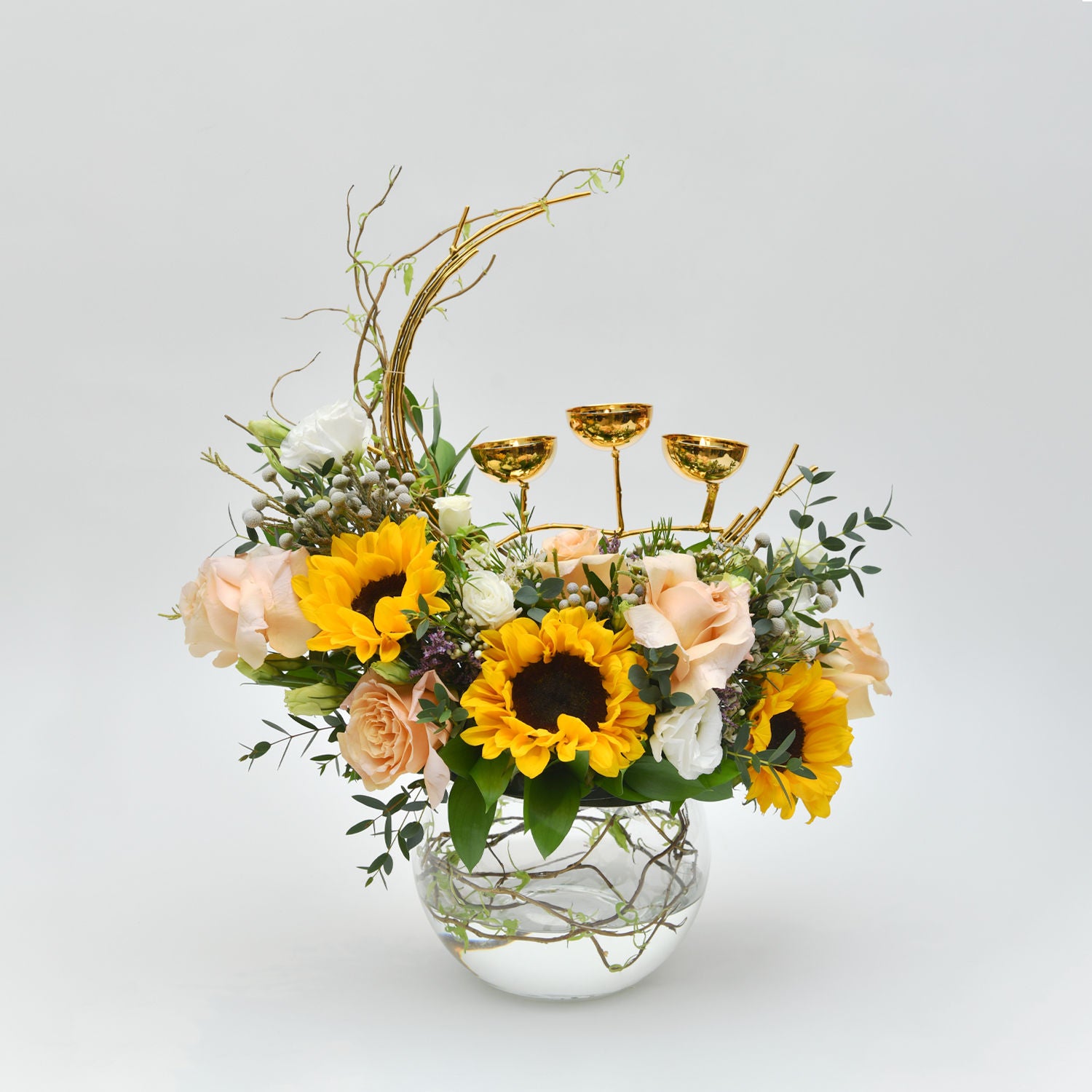 Mix Flowers in Fish Bowl with Candle Holder