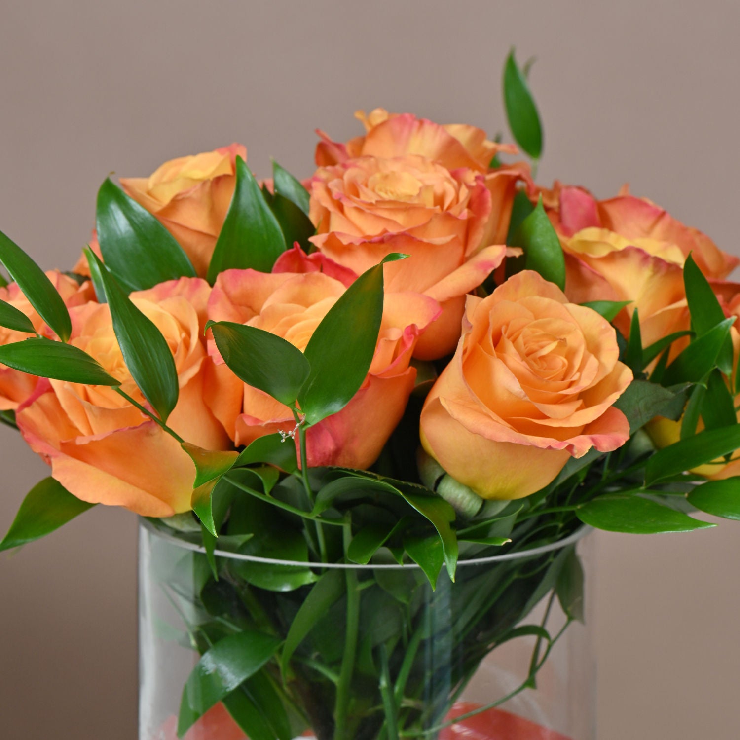 Orange Roses in Glass Vase