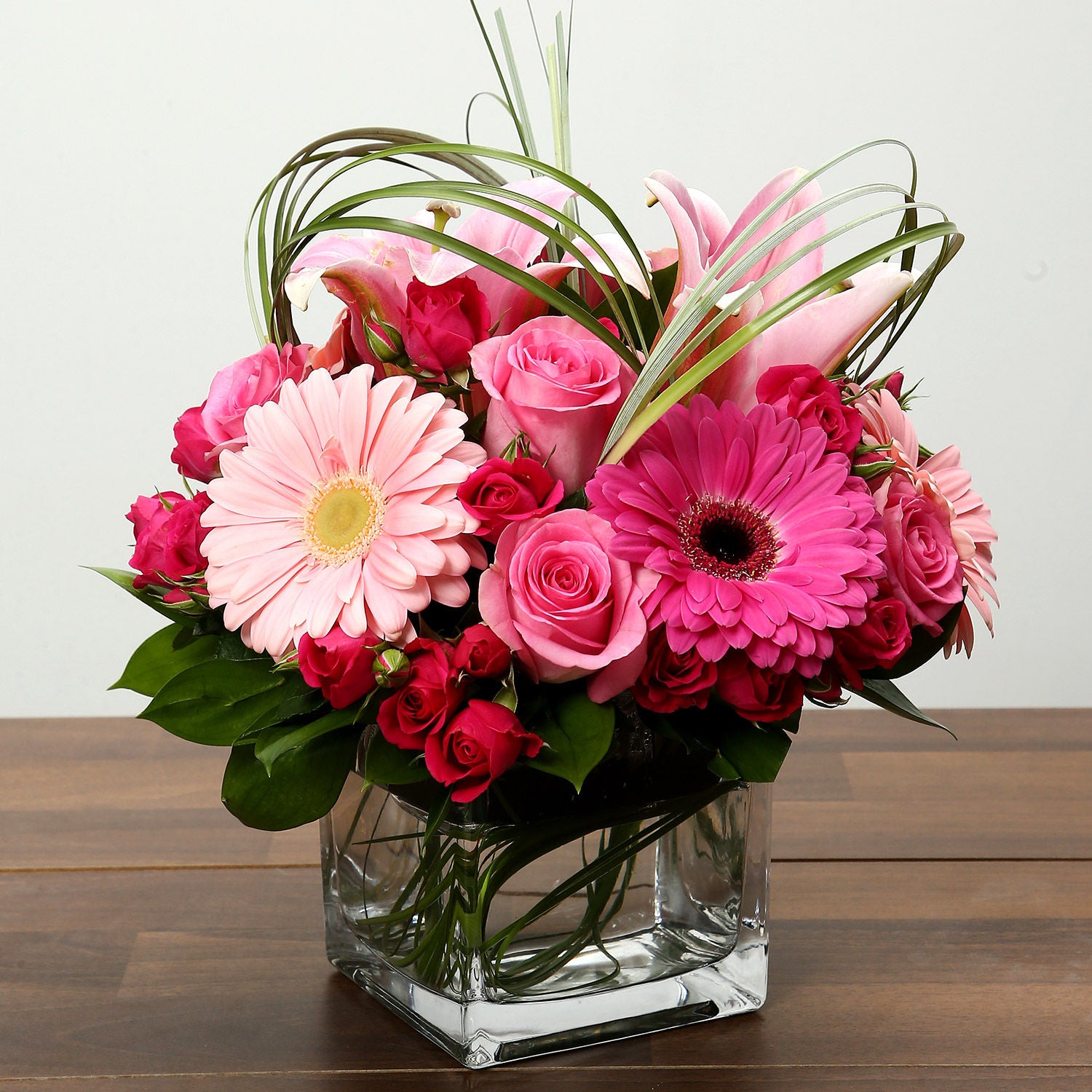 Roses and Gerbera Arrangement In Glass Vase